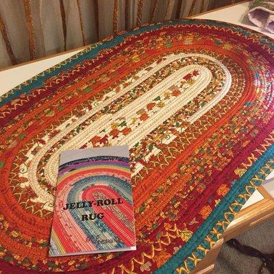 Pattern, batting rolls and fabrics available to make a Jelly Roll Rug