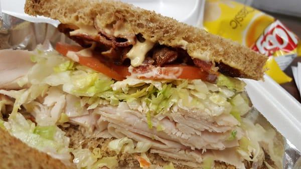 The Jules sandwich on wheat... Turkey, bacon, lettuce, tomato, chipotle mayo. $7.24 w.chips included