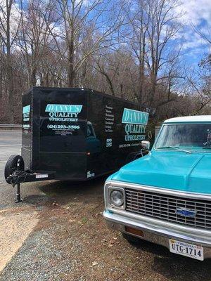 Danny's Quality Upholstery's mobile trailer and branded Chevy pick-up truck.