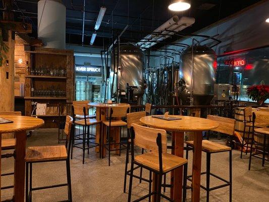 Brewing equipment next to the bar area.