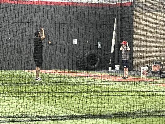 My middle boy warming up before his pitching lesson with a former AAA player!