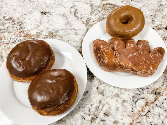 chocolate glazed custard, bear claw, maple glazed