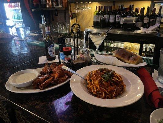 Jumbo Chicken Wings, Spaghetti, martini, and beer.