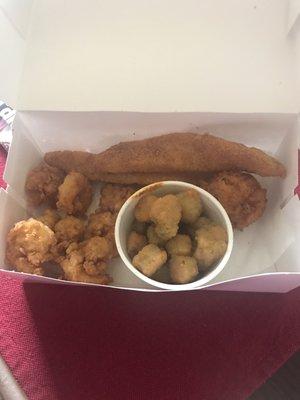 2 pieces fried fish, 8 fried shrimp, fried okra & a lg hushpuppy. Great food, will go back.