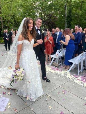 Bouquet and aisle petals