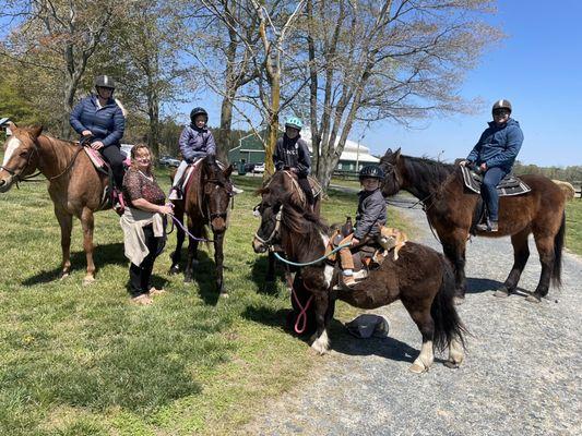 Horses, family and staff along with  "Marley" the friendly seeing eye dog