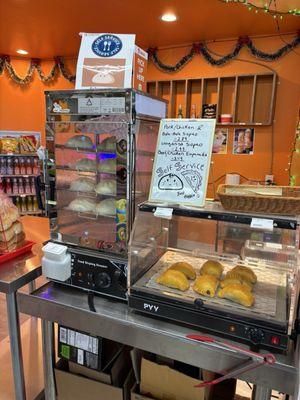 A variety of hot steamed Siopao plus beef & chicken empanadas, love this!