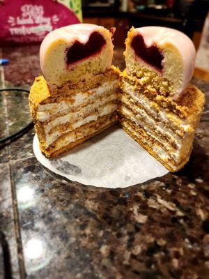 Cross section of honey cake and mousse cake