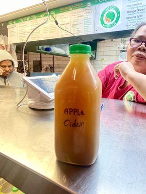 Saturday, 9 December 2023 -- $8 APPLE CIDER (cold) from the Juice Garden inside the West Side Market.