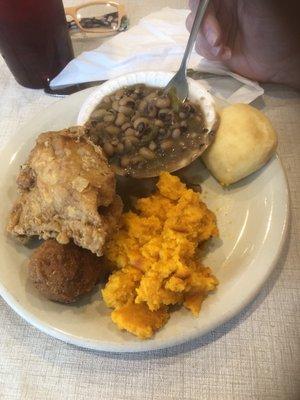 My wife got the fried chicken breast , sweet carrot soufflé, field peas and sweet tea. I