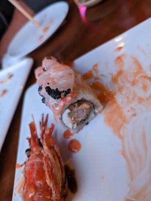 Raw shrimp end of dragon roll that server says is normal.