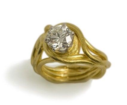 22k gold custom ring with a 1.75 ct. ideal cut diamond