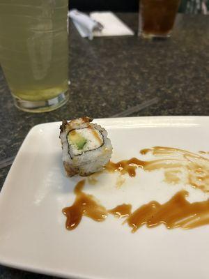 The last lonely bite of my dragon roll. Sorry, I wolfed it