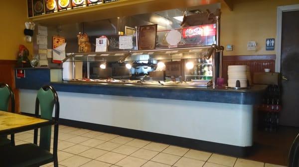 A buffet is uncommon in a strip mall Chinese restaurant.