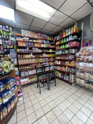 Showing off some of their canned goods and snacks