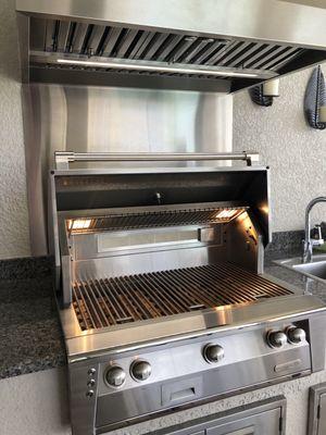 Alfresco Grill and Falmec Vent Hood, with custom Stainless Steel Backsplash