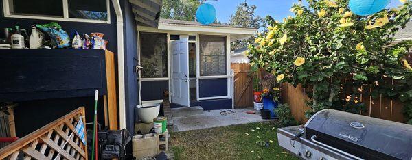 The back door and windows before the install from the exterior