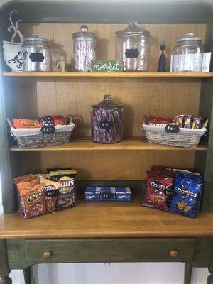 Selection of old-time candy, popular candy bars and chips.