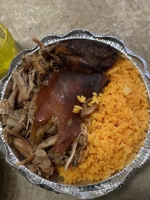 Pernil with yellow rice, beans and plantains. Lunch special $8.70