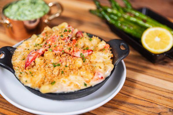 Indulge in Preston's Artisan Mac & Cheese, featuring rich, creamy cheese and perfectly baked pasta for the ultimate comfort dish.