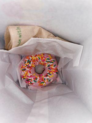 Strawberry donut with sprinkles