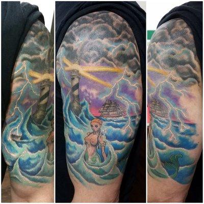 Mermaid storm scene tattoo by Joe Bass @ Happiness Tattoo