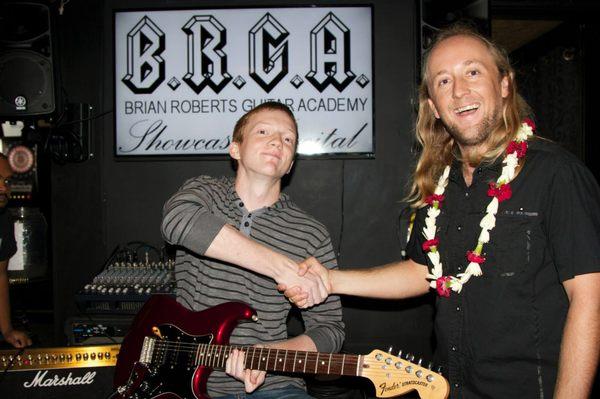 Brian with one of his students after his performance.