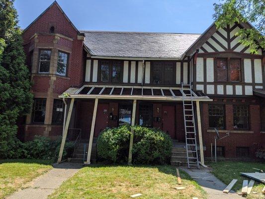 Rebuilding a sunken porch roof on a historic home.