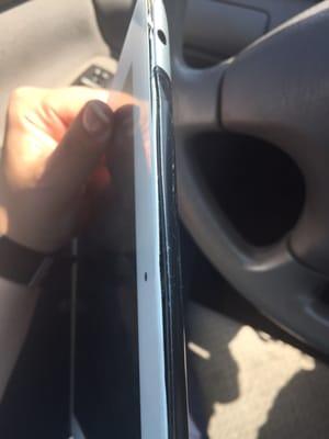 Huge gaping, bent out of shape top of my now "fixed" iPad 4 because they pried it open in the wrong spot initially.