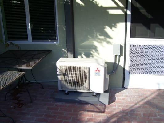 An outdoor Mitsubishi home unit