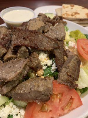 Greek salad with gyro meat and ranch dressing