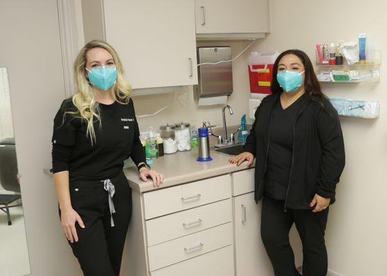 PA Amanda Palmer and medical assistant Melissa in a treatment room at The Dermatology & Laser Center of San Antonio