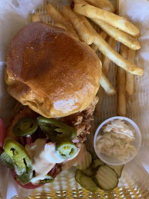 Crispy chicken sandwich with fries and coleslaw