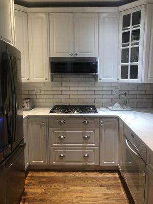 Quartz countertop and subway tile backsplash