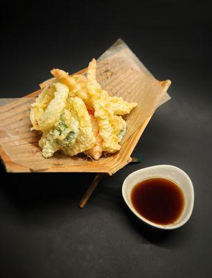 Tempura Udon - udon noodle soup, served with shrimp and vegetable tempura on the side.