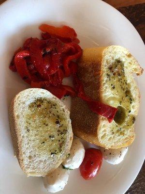 Bread, peppers and caprese salad