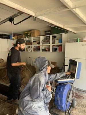 Adan and Luis camera the main sewer, preparing to descale. 
 @beachplumbinglbc on Facebook and Instagram