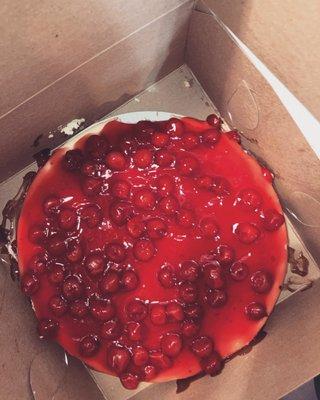 10 inch cheesecake with cherry sauce and cherries  the best cheesecake in the world