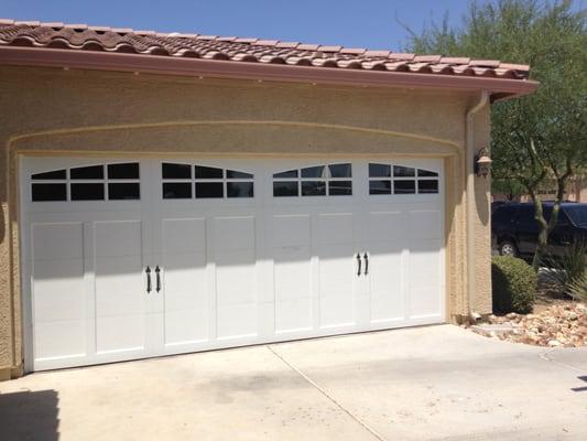 16×7 Clopay Coachman  collection 12 with Arch 4 glass top  carriage garage door , install and Goodyear Arizona