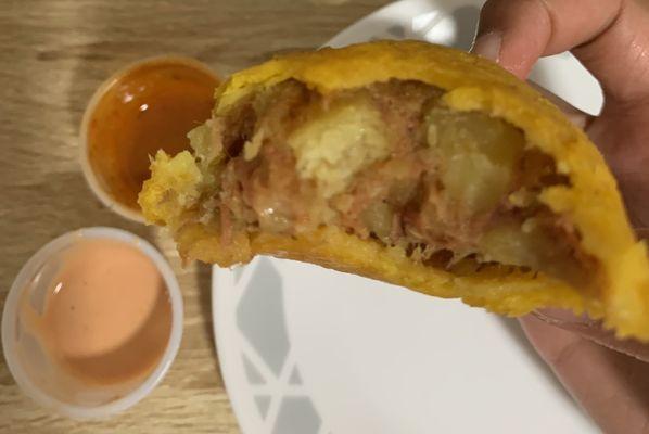 Beef empanada with spicy salsa and a mayo ketchup ($2.50)