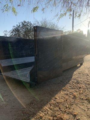 Rented dumpster dropped. Nice it was cleaned prior to arrival.