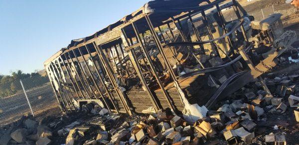 Car trailer after wildfires in Morgan Hill. A fire break would have prevented over $97,000 of damage caused to our property.