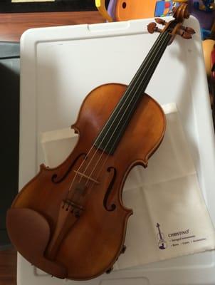 My violin after repairs, part replacements, and a much-needed cleaning