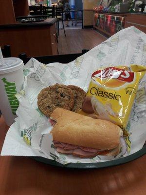 6 inch sub with ham, salami, lettuce, tomatoes & onions. Chips, a beverage and 3 oatmeal cookies.