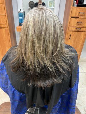 Heavy highlights, and layered cut by Cindy.