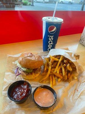 Cheeseburger, fries, and a coke.