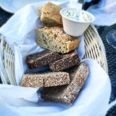 Bread basket for 2 w/ herb butter (Pfeiffer sourdough, seeded dark rye & rosemary focaccia)