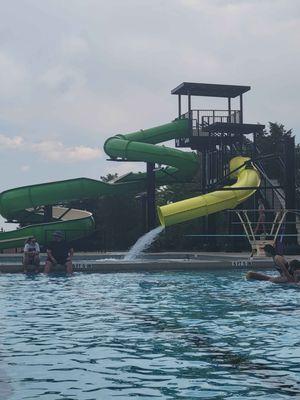 Thr new slides and the diving boars in the diving well, as seen from the lap pool