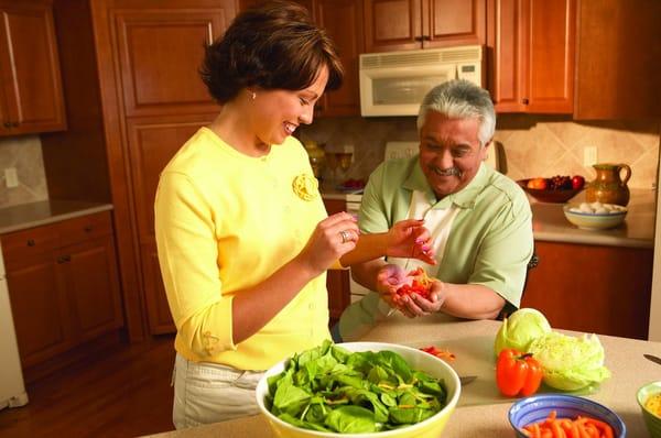 Home Instead Senior Care assists seniors with meal preparation