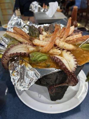 Molcajete el Patron- this bad boy has octopus, cactus, fish, shrimp all swimming in a semi spicy sauce.  Alot of food come ready to eat.